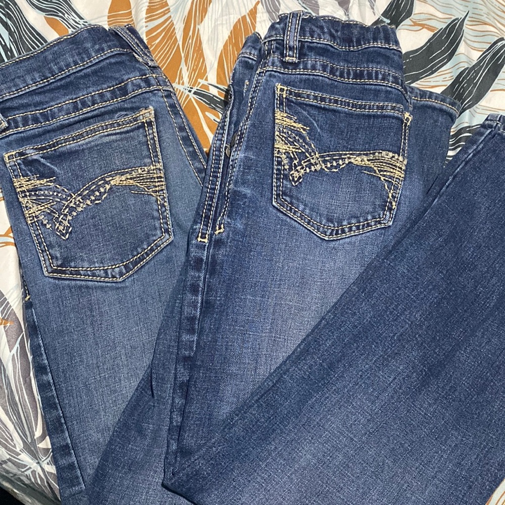 2 wrangler 20X jeans